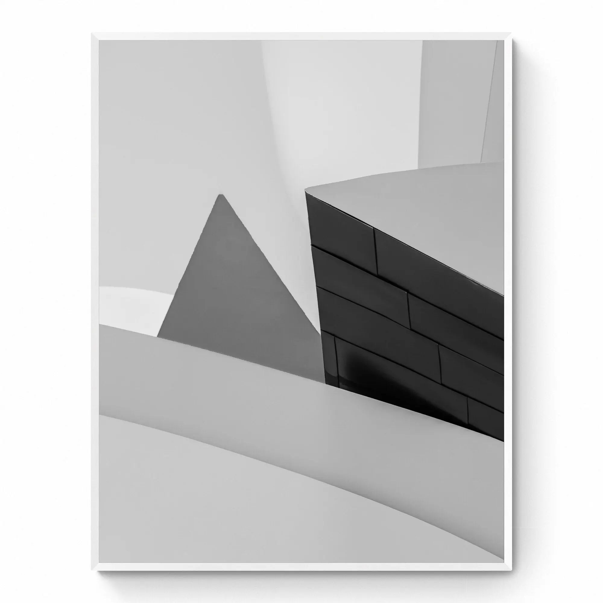 Abstract geometric shapes in a monochrome palette at the Guggenheim Museum Bilbao, showcasing contemporary architectural design.