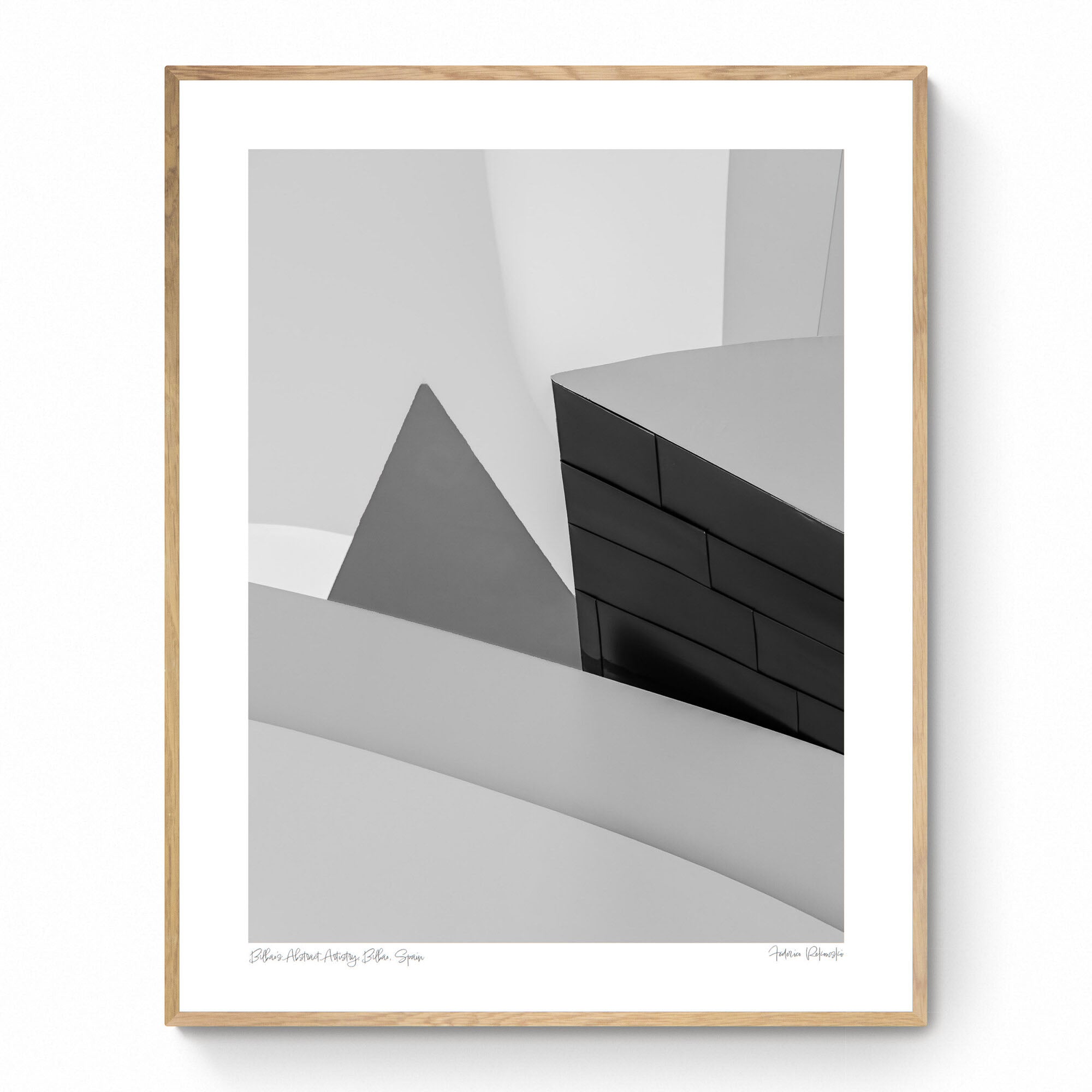 Abstract geometric shapes in a monochrome palette at the Guggenheim Museum Bilbao, showcasing contemporary architectural design.