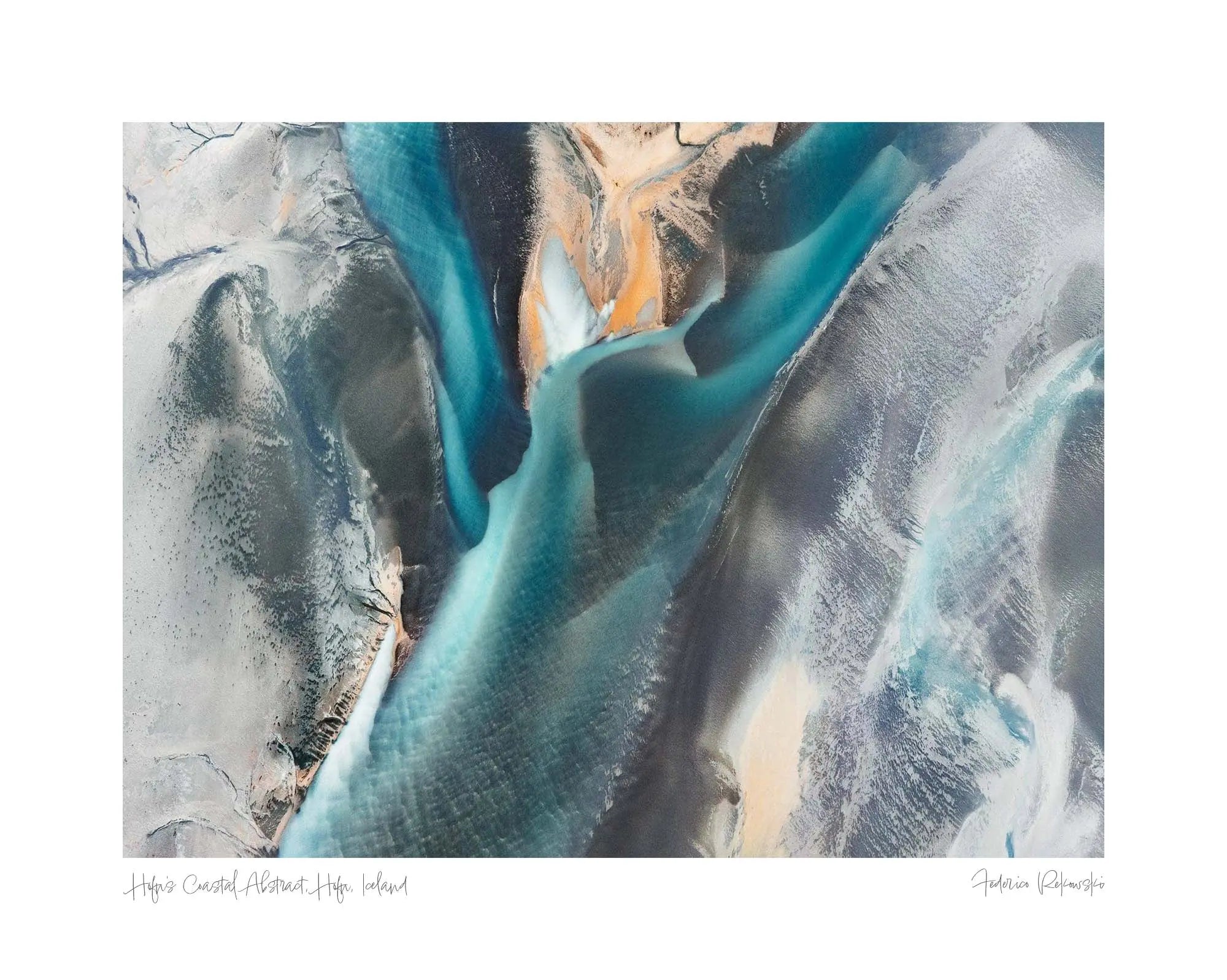 Aerial shot of the dynamic interface between water and volcanic sands near Höfn, Iceland, displaying a stunning abstract pattern.