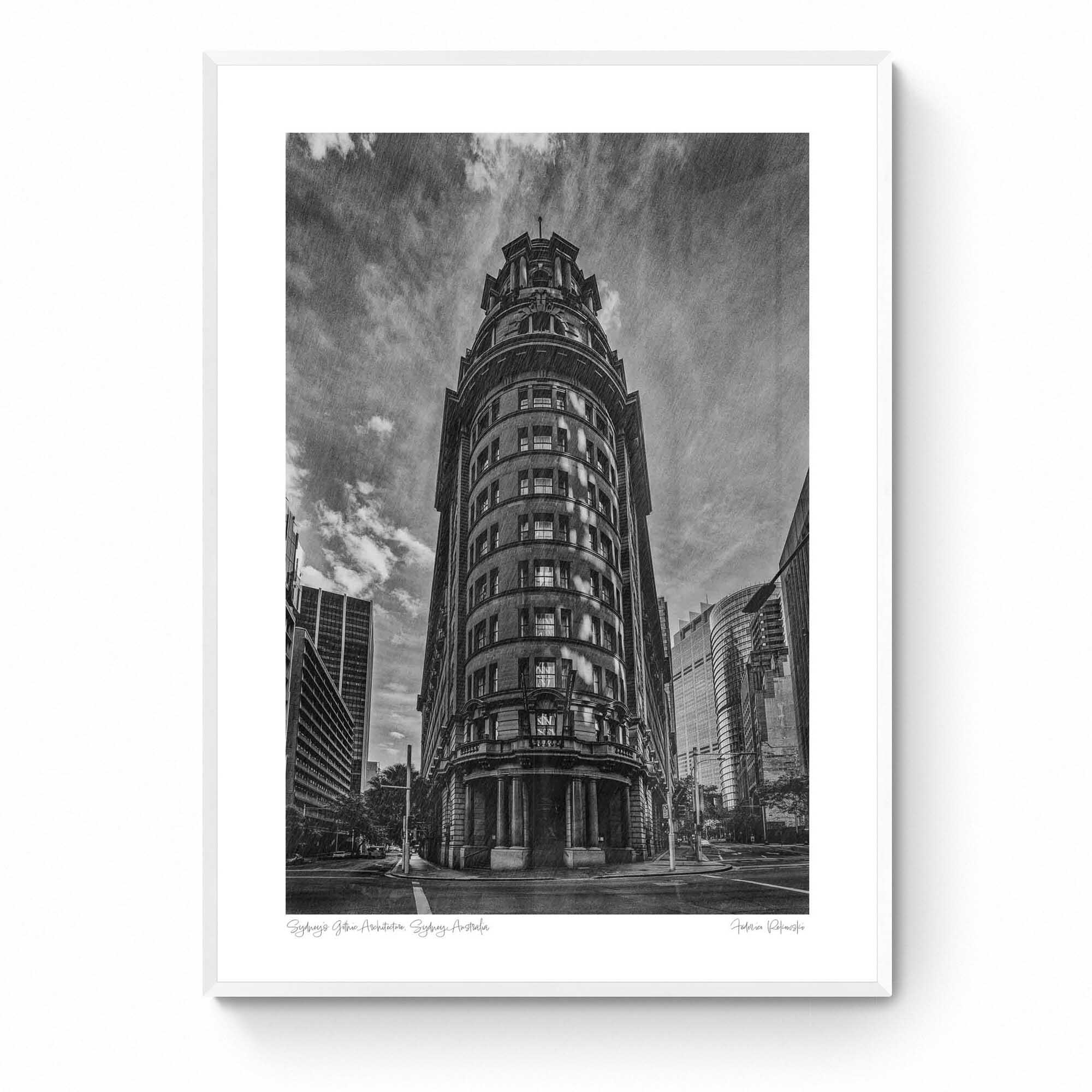 Black and white photo of an ornate, historic building in Sydney, Australia, with a dramatic sky in the background.