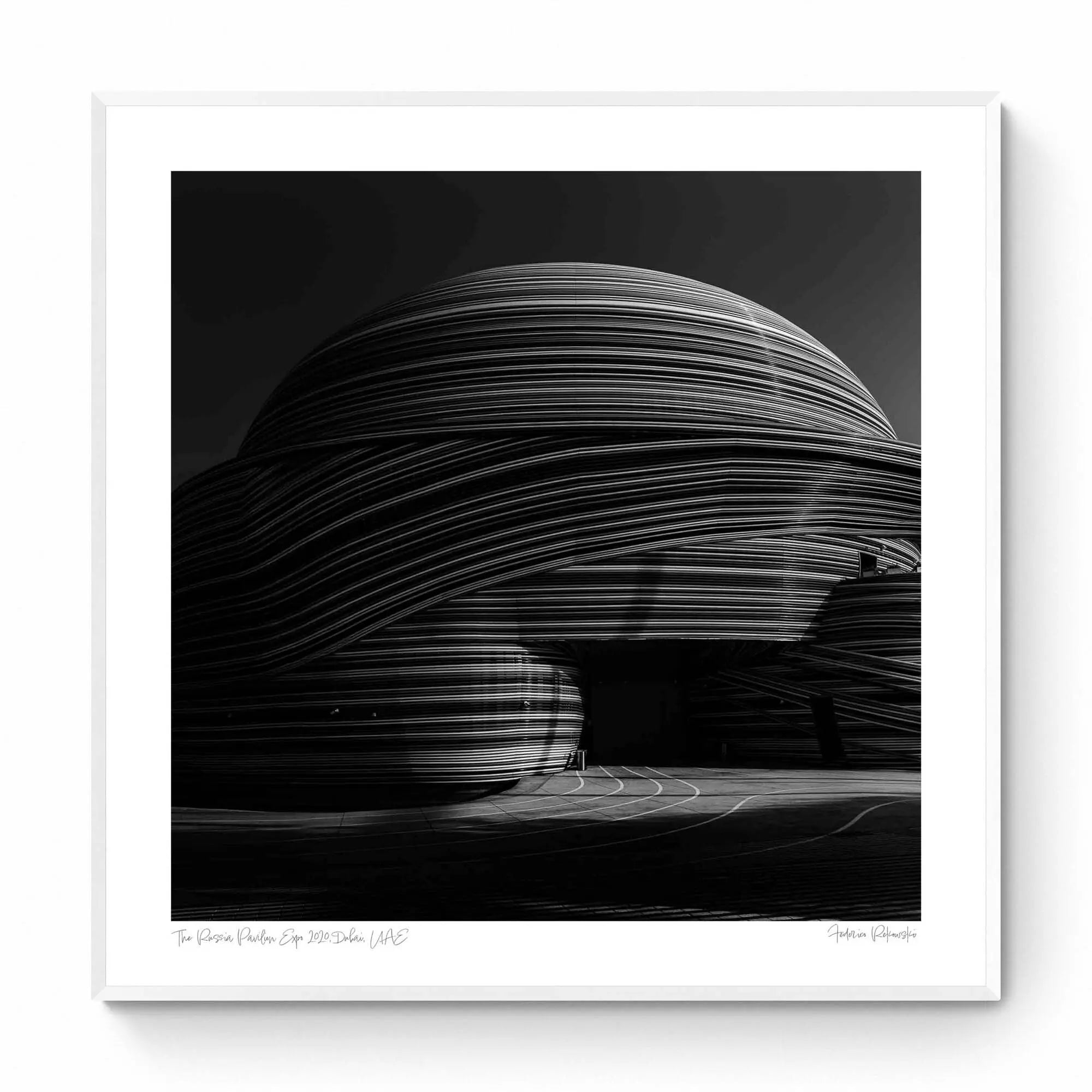 Black and white photo showcasing the striking, layered lines of the Russia Pavilion in Dubai.