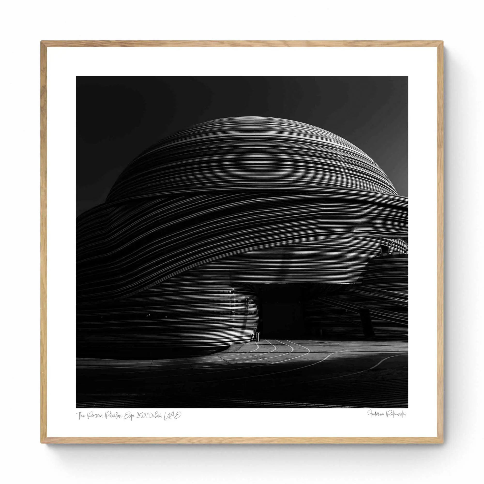 Black and white photo showcasing the striking, layered lines of the Russia Pavilion in Dubai.