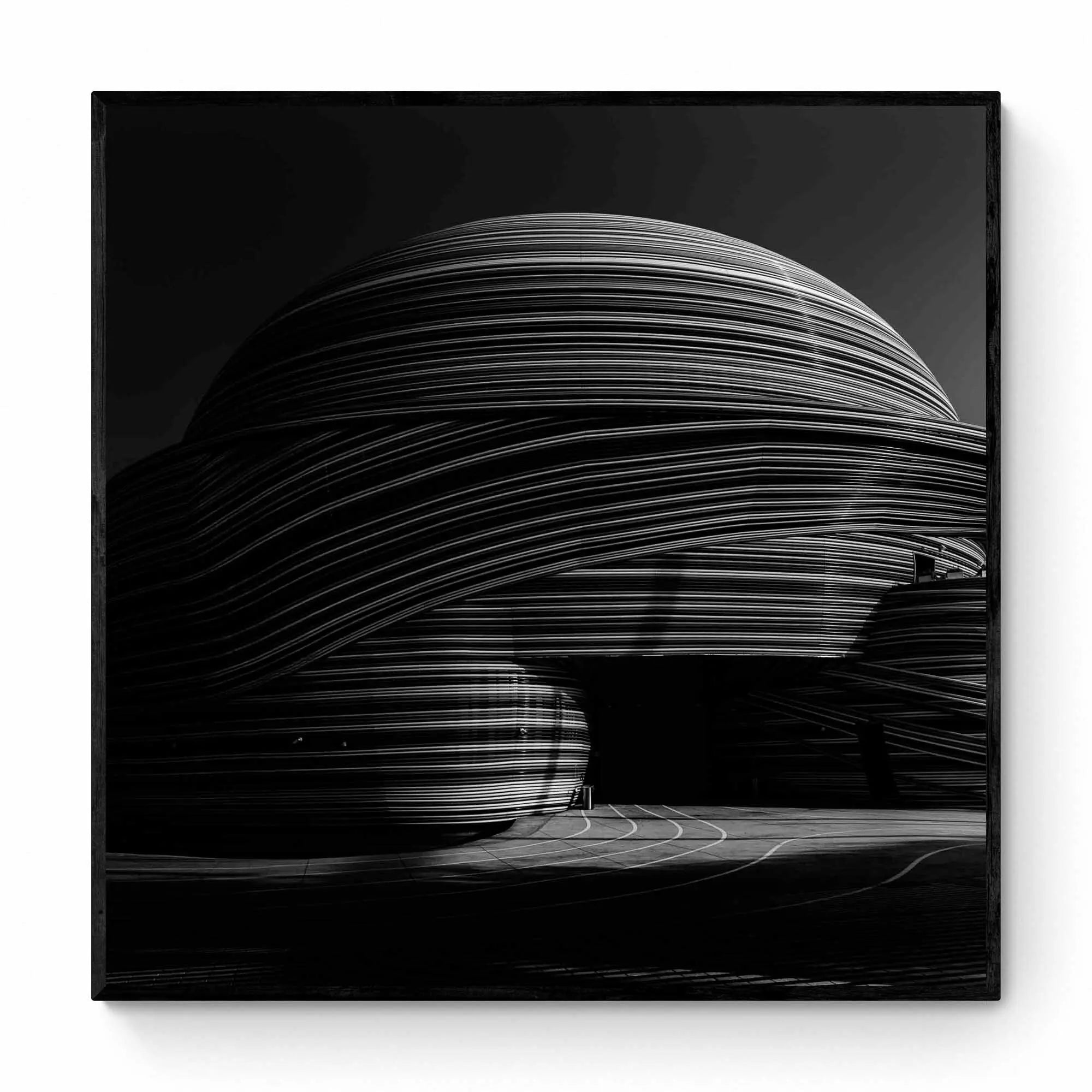 Black and white photo showcasing the striking, layered lines of the Russia Pavilion in Dubai.