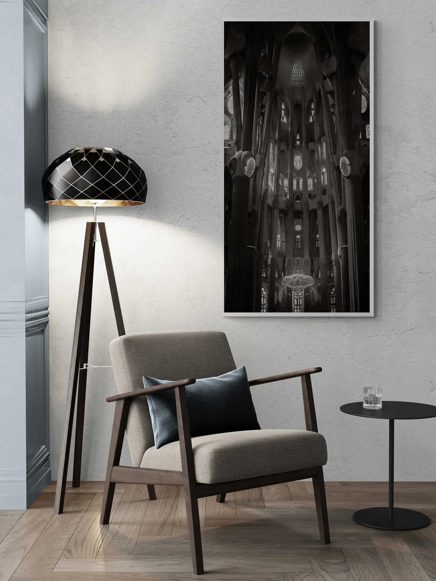 "Black and white interior view of La Sagrada Familia's columns and ceiling details, capturing the play of light and shadow."