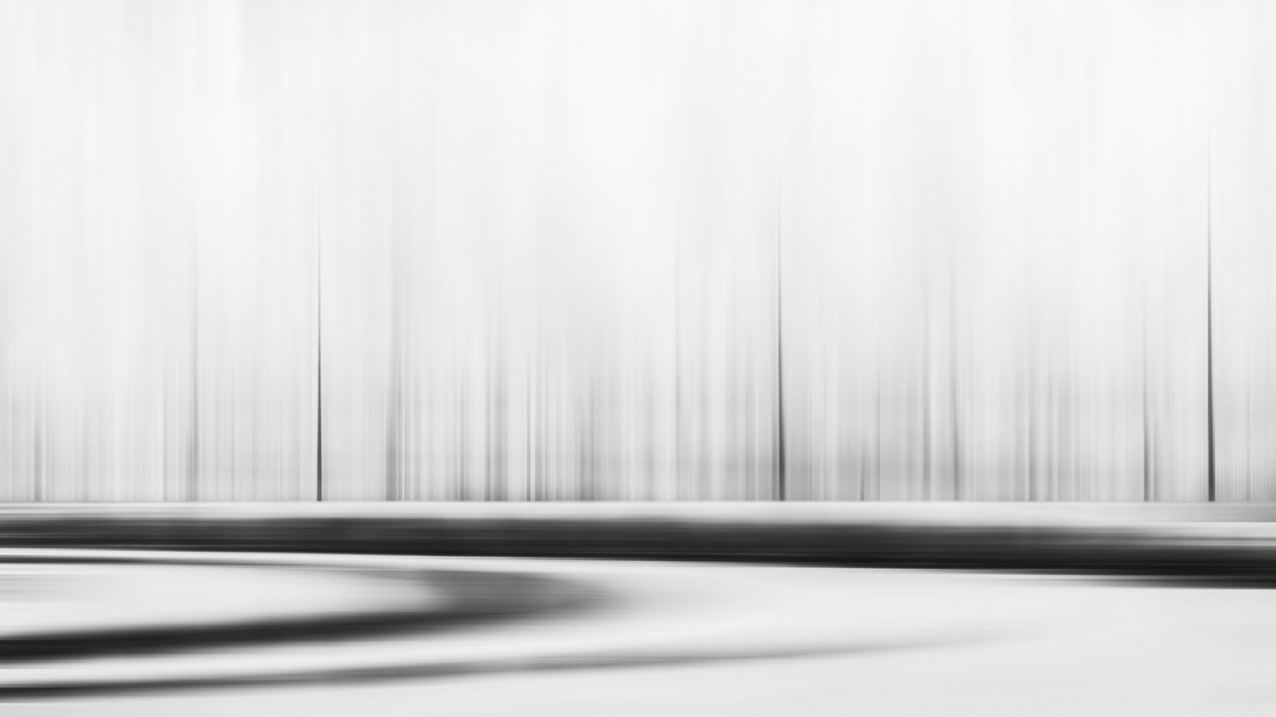 "Minimalist black and white photo of a roundabout, symbolizing the endless passage of time."
