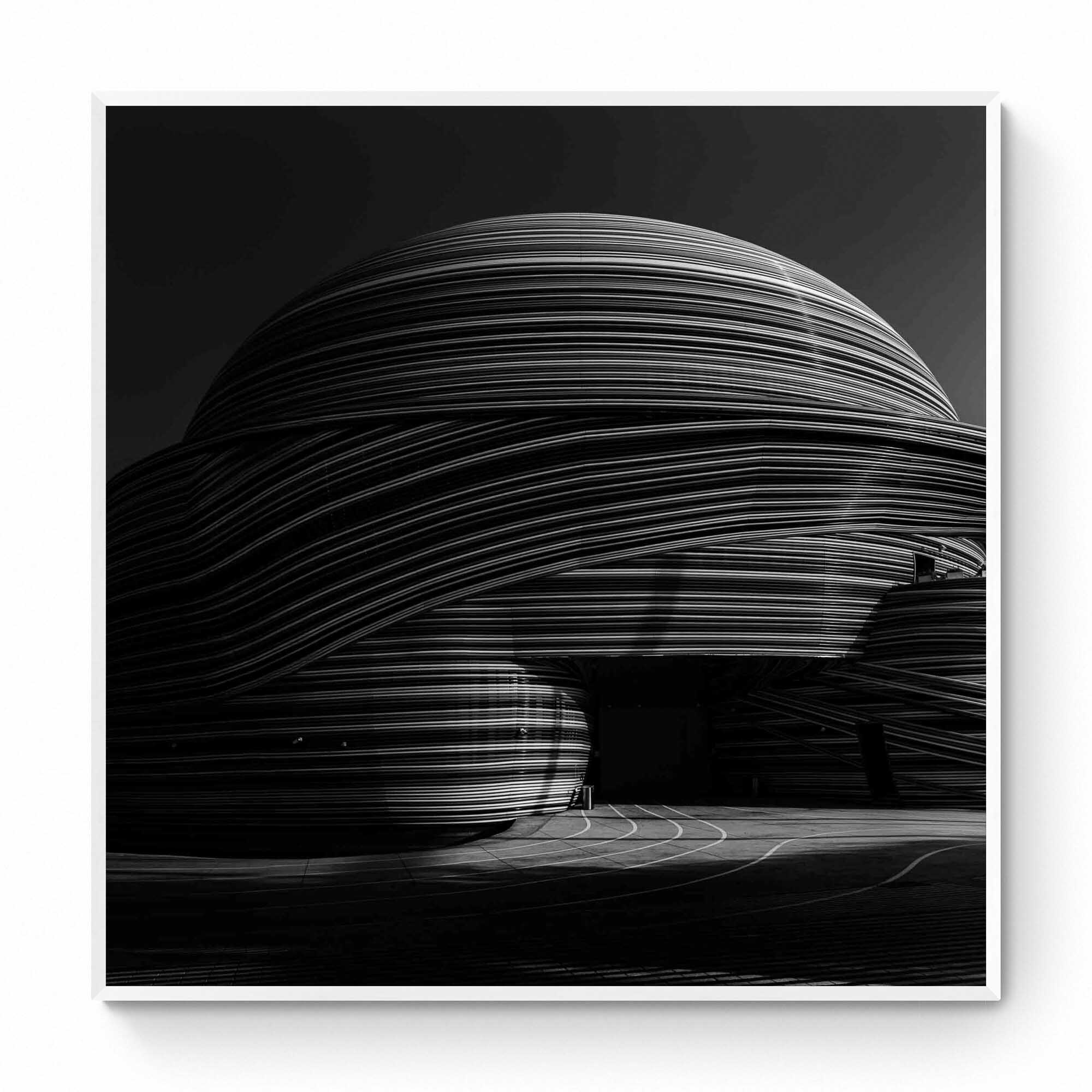 Black and white photo showcasing the striking, layered lines of the Russia Pavilion in Dubai.