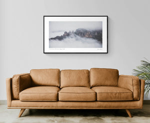 The Three Sisters rock formation in Sydney, Australia, is enshrouded in mist, as viewed from Sublime Point.